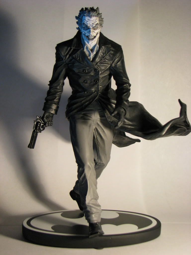 the joker black and white statue