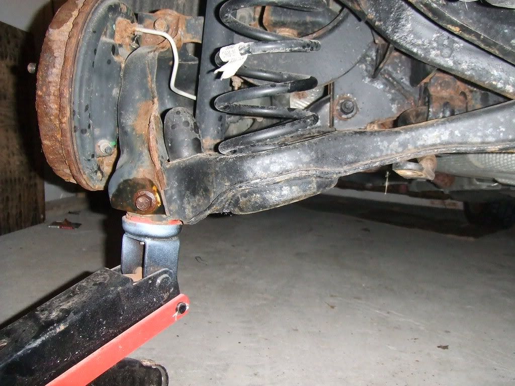 How to remove lower control arm ford taurus #1