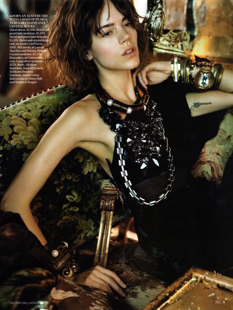 Polkadot stockings, chunky jewelry & gun tattoos. Vogue UK Sept 2009