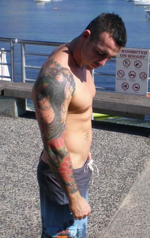  picture of his tattoos and, since he was obviously very shy, he let me.