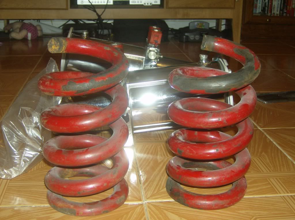 2 Reds old school hydraulic pumps