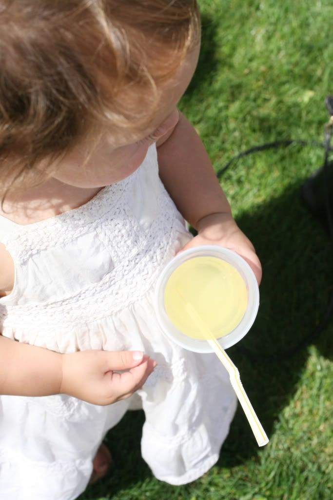 baby with lemonade from sunshine stand